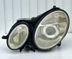 Mercedes Benz E-class W211 Xenon Headlight Left Passenger Side (154359-00) Used. Price: $161.36.
