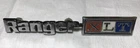 1973 1979 Ford Xlt Ranger Glove Box Emblem Used. Price: $45.00.