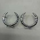 (2) 1982-96 Cadillac Wreath Emblems 7643400 W4 Used. Price: $21.95.