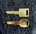 2 Sets - Gm Logo Oem "e" Ignition And "h" Doors/trunk Key Blanks Uncut New. Price: $19.99.