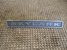 1964 Buick Skylark Glove Box Emblem Script 4416947 Used. Price: $35.00.
