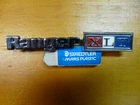 1973 To 1976 Ranger Xlt Chrome Glovebox Emblem Original D6TB-1004460-BA Used. Price: $24.90.