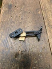 Vintage Triumph TR6 Glove Box Check Link Assy. Plastic #630972 Used. Price: $20.00.