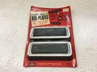 Vintage Automotive Accessory Diamond-e Kik-plates Rubber & Aluminum Nib New. Price: $15.00.