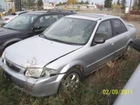 Protege 2000 Glove Box 46406 Used. Price: $175.00.