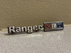 1973-1977 Ford F150 Ranger Xlt Glove Box Emblem Badge D3TB-1004460-CA Used. Price: $22.00.