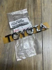 2008-2010 Toyota Highlander Plate, Back Door Name, NO.2 P/n 75442-48090 New. Price: $29.95.