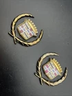 1970S 1980S Cadillac Gold Metal Wreath And Crest Pillar Sail Panel Emblem Pair Used. Price: $64.99.
