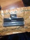 GM#10143682, 1988-1990 Cutlass Glove Box Striker New. Price: $30.00.